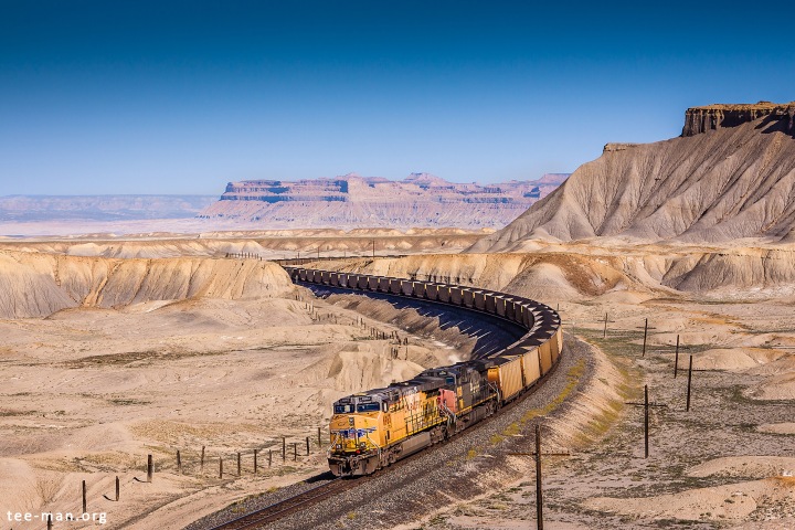 Union Pacific's 6963 is helping a coal train getting to its destination in the moon-like landscape around Green River. 1.6.2014